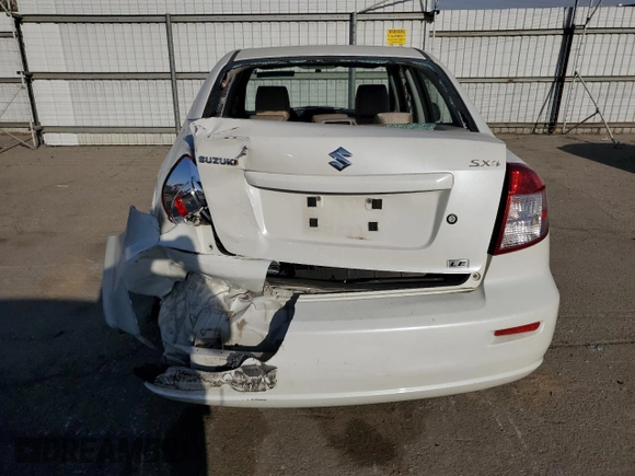 2009 Suzuki SX4 Man FWD with VIN JS2YC412796200908, listed as a Copart auction lot 73821924 with 125,721 mi miles and Salvage Title. Bid and sale history available at carsss.com. Image 6.