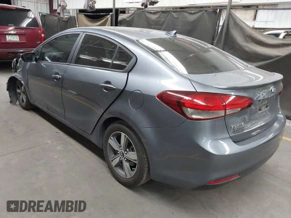 2018 Kia Forte LX with VIN 3KPFL4A76JE210647, listed as a IAAI auction lot 41838853 with 148,488 mi miles and . Bid and sale history available at DreamBid. Image 3.