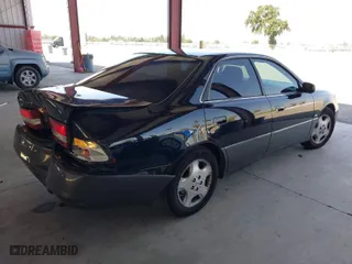 2000 Lexus ES 300 with VIN JT8BF28G3Y5094800, listed as a IAAI auction lot 42053242 with 147,169 mi miles. Bid and sale history available at carsss.com. Image 4.
