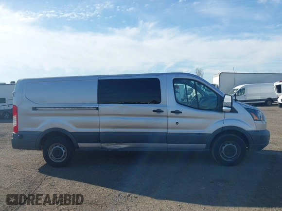 2017 Ford Transit z VIN 1FTYR2YMXHKA63019, wystawiony jako IAAI lot #41613283 z przebiegiem 182 946 mil mil oraz . Historia ofert i sprzedaży dostępna na DreamBid. Obrazek 13.