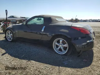 2004 Nissan 350Z Touring with VIN JN1AZ36A74T002301, listed as a Copart auction lot 61720524 with 101,779 mi miles and Salvage Title. Bid and sale history available at carsss.com. Image 2.