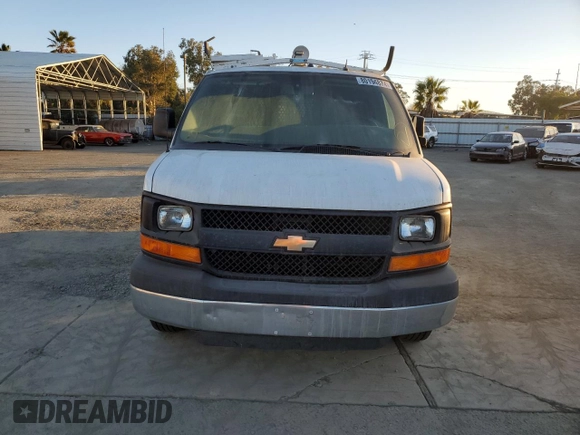 2014 Chevrolet Express Cargo z VIN 1GCWGFCB0E1122350, wystawiony jako Copart lot #58278045 z przebiegiem 99 593 mil mil oraz Czysty tytuł • Clean title. Historia ofert i sprzedaży dostępna na DreamBid. Obrazek 5.