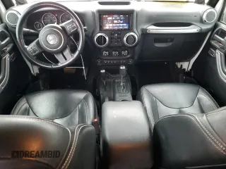 2014 Jeep Wrangler Unlimited Rubicon с VIN 1C4BJWFG9EL150370, выставлен на аукционе Copart как лот 49917075 с пробегом 110 756 миль миль и Списание • Salvage title. История ставок и продаж доступна на DreamBid. Изображение 8.
