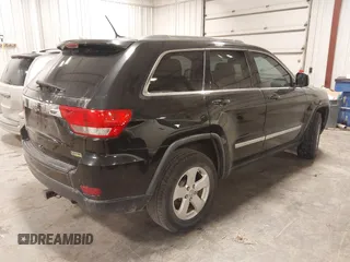 2012 Jeep Grand Cherokee Laredo with VIN 1C4RJFAG6CC266144, listed as a IAAI auction lot 41497163 with 233,755 mi miles. Bid and sale history available at carsss.com. Image 4.