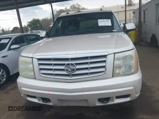 2004 Cadillac Escalade с VIN 1GYEK63N44R189287, выставлен на аукционе IAAI как лот 41761942 с пробегом 276 121 миль миль и . История ставок и продаж доступна на DreamBid. Изображение 12.