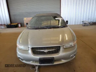 2000 Chrysler Sebring JXi z VIN 3C3EL55H7YT264635, wystawiony jako Copart lot #47325535 z przebiegiem 110 000 mil mil oraz Szkody całkowita. Historia ofert i sprzedaży dostępna na DreamBid. Obrazek 5.