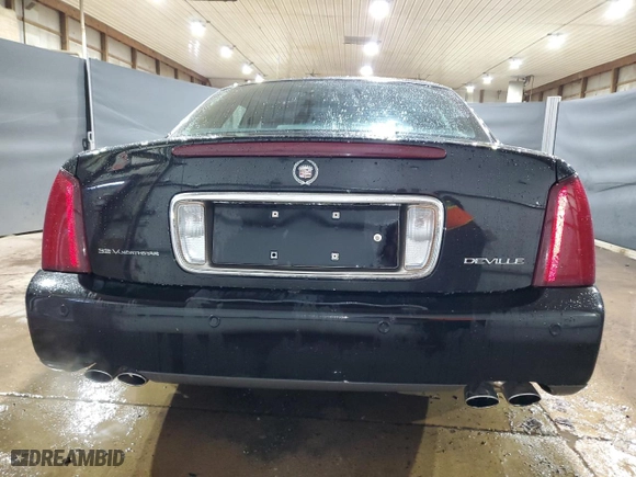 2000 Cadillac DeVille with VIN 1G6KD54Y7YU205199, listed as a Copart auction lot 87620335 with 67,622 mi miles and Clean Title. Bid and sale history available at carsss.com. Image 6.