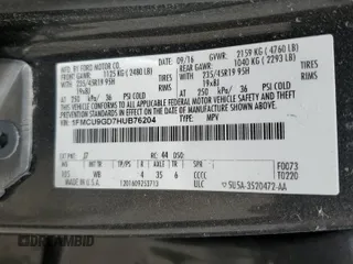 2017 Ford Escape SE z VIN 1FMCU9GD7HUB76204, wystawiony jako Copart lot #58334725 z przebiegiem Nie podano mil oraz Szkoda całkowita • Salvage title. Historia ofert i sprzedaży dostępna na DreamBid. Obrazek 12.