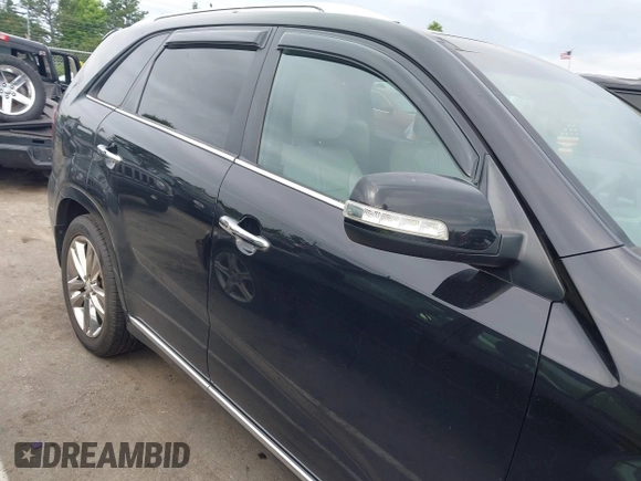 2014 Kia Sorento SX z VIN 5XYKWDA7XEG485405, wystawiony jako IAAI lot #42312938 z przebiegiem 169 728 mil mil oraz . Historia ofert i sprzedaży dostępna na DreamBid. Obrazek 13.
