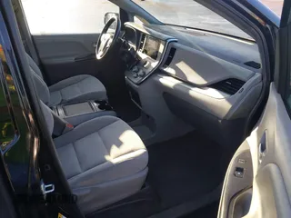 2015 Toyota Sienna LE AAS with VIN 5TDKK3DC2FS615423, listed as a IAAI auction lot 42218623 with 232,838 mi miles and . Bid and sale history available at DreamBid. Image 5.