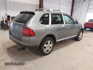 2004 Porsche Cayenne S with VIN WP1AB29P54LA69098, listed as a IAAI auction lot 41619941 with 236,820 mi miles. Bid and sale history available at carsss.com. Image 4.