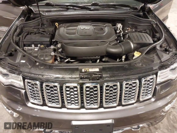 2017 Jeep Grand Cherokee Overland z VIN 1C4RJFCG6HC641812, wystawiony jako IAAI lot #42053404 z przebiegiem 129 184 mil mil oraz . Historia ofert i sprzedaży dostępna na DreamBid. Obrazek 10.