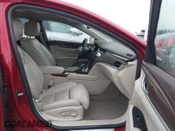 2013 Cadillac XTS Luxury with VIN 2G61P5S32D9115640, listed as a IAAI auction lot 41065284 with 125,643 mi miles and . Bid and sale history available at carsss.com. Image 5.