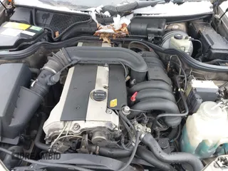 1996 Mercedes-Benz E-Class with VIN WDBJF55F5TJ007150, listed as a IAAI auction lot 41518340 with 178,930 mi miles. Bid and sale history available at carsss.com. Image 10.