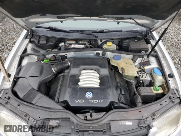 2000 Volkswagen Passat z VIN WVWPD23B0YP431209, wystawiony jako Copart lot #84954554 z przebiegiem 149 382 mil mil oraz Szkoda całkowita • Salvage title. Historia ofert i sprzedaży dostępna na DreamBid. Obrazek 11.