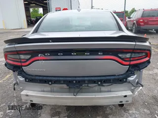 2015 Dodge Charger SXT with VIN 2C3CDXHG1FH886088, listed as a IAAI auction lot 42331369 with 119,659 mi miles and . Bid and sale history available at DreamBid. Image 6.