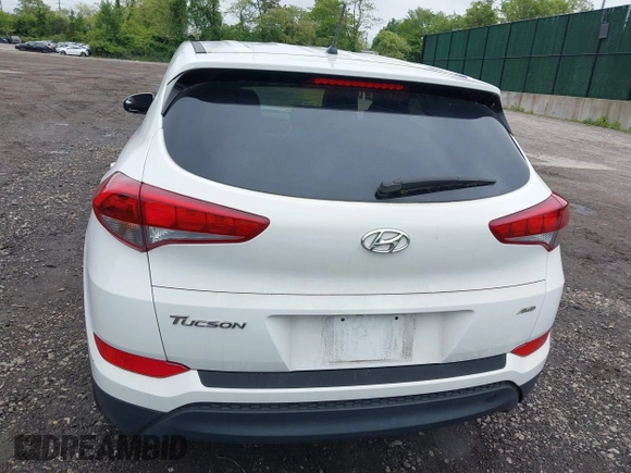 2018 Hyundai Tucson SE z VIN KM8J2CA41JU807280, wystawiony jako IAAI lot #42301977 z przebiegiem 62 415 mil mil oraz . Historia ofert i sprzedaży dostępna na DreamBid. Obrazek 16.
