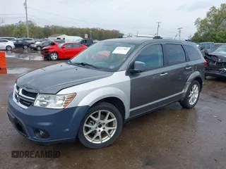 2012 Dodge Journey Crew z VIN 3C4PDCDG9CT146593, wystawiony jako IAAI lot #42127303 z przebiegiem 137 861 mil mil oraz . Historia ofert i sprzedaży dostępna na DreamBid. Obrazek 6.
