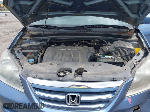 2007 Honda Odyssey EX with VIN 5FNRL38437B126937, listed as a IAAI auction lot 42098793 with 212,343 mi miles and . Bid and sale history available at DreamBid. Image 10.