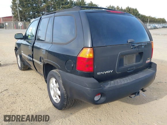 2006 GMC Envoy SLT with VIN 1GKDS13SX62260454, listed as a IAAI auction lot 41479478 with 255,019 mi miles. Bid and sale history available at carsss.com. Image 3.