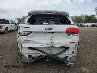 2019 Jeep Grand Cherokee Summit with VIN 1C4RJFJT4KC848996, listed as a Copart auction lot 54974925 with 106,517 mi miles and Salvage title. Bid and sale history available at DreamBid. Image 6.
