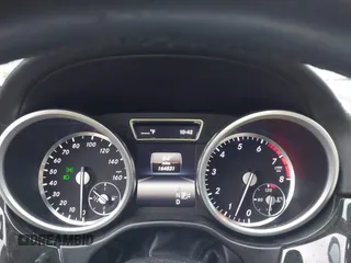 2016 Mercedes-Benz GL with VIN 4JGDF7DE3GA655476, listed as a IAAI auction lot 41710919 with 164,831 mi miles. Bid and sale history available at carsss.com. Image 7.
