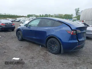 2023 Tesla Model Y Long Range z VIN 7SAYGDEE6PF603981, wystawiony jako IAAI lot #42133348 z przebiegiem 28 566 mil mil oraz . Historia ofert i sprzedaży dostępna na DreamBid. Obrazek 3.