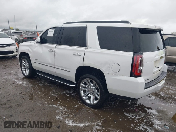 2018 GMC Yukon SLT with VIN 1GKS1BKC8JR392851, listed as a IAAI auction lot 40744741 with 117,028 mi miles. Bid and sale history available at carsss.com. Image 3.