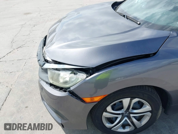 2018 Honda Civic Sedan LX with VIN 19XFC2F59JE044099, listed as a IAAI auction lot 41719337 with 44,534 mi miles. Bid and sale history available at carsss.com. Image 6.
