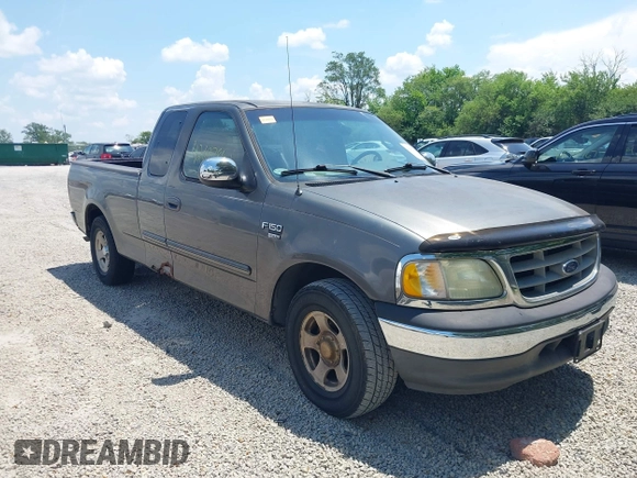 2002 Ford F-150 XL with VIN 1FTRX17W22NA43571, listed as a IAAI auction lot 42697861 with Not provided miles and . Bid and sale history available at DreamBid. Image 1.