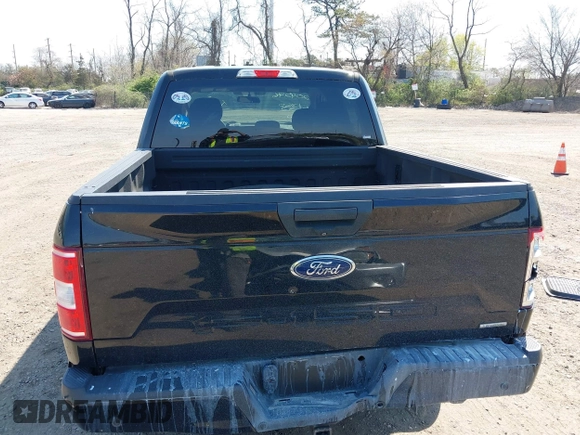 2018 Ford F-150 XL with VIN 1FTEW1EP2JFE13018, listed as a IAAI auction lot 42040276 with 97,563 mi miles. Bid and sale history available at carsss.com. Image 16.