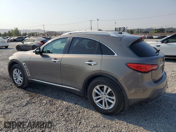 2010 Infiniti FX with VIN JN8AS1MW7AM851892, listed as a Copart auction lot 64990275 with 125,266 mi miles and Salvage title. Bid and sale history available at DreamBid. Image 2.
