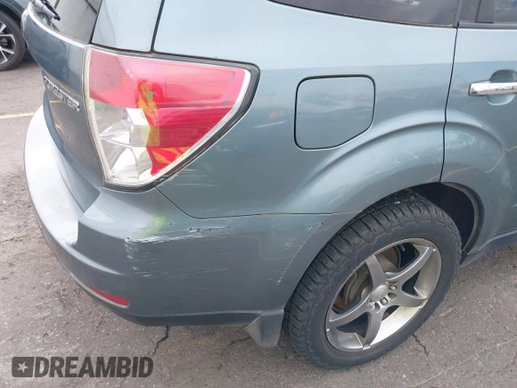 2009 Subaru Forester X Limited z VIN JF2SH64679H745265, wystawiony jako IAAI lot #42205180 z przebiegiem 173 852 mil mil oraz . Historia ofert i sprzedaży dostępna na DreamBid. Obrazek 18.