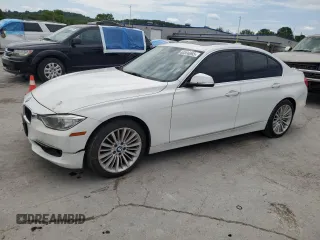 2014 BMW 3 Series 328i with VIN WBA3A5G54ENP32261, listed as a Copart auction lot 63806965 with 184,414 mi miles and Salvage title. Bid and sale history available at DreamBid. Image 1.