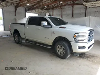 2023 Ram 2500 Laramie with VIN 3C6UR5FL2PG632162, listed as a Copart auction lot 56220575 with 59,902 mi miles and Salvage title. Bid and sale history available at DreamBid. Image 4.