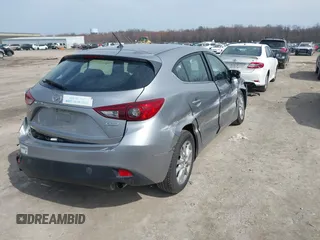 2015 Mazda 3 i Touring with VIN 3MZBM1L77FM138326, listed as a IAAI auction lot 41839685 with 97,506 mi miles and . Bid and sale history available at carsss.com. Image 4.