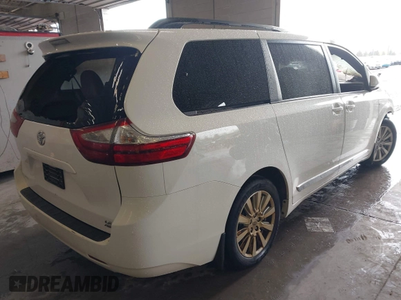 2017 Toyota Sienna LE with VIN 5TDJZ3DC5HS180200, listed as a IAAI auction lot 42204077 with 114,726 mi miles and . Bid and sale history available at DreamBid. Image 4.