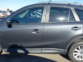 2016 Mazda CX-5 Touring with VIN JM3KE2CY4G0695947, listed as a IAAI auction lot 41824490 with 162,191 mi miles and . Bid and sale history available at carsss.com. Image 15.