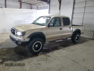 2001 Toyota Tacoma PreRunner z VIN 5TEGN92N31Z833872, wystawiony jako Copart lot #58494085 z przebiegiem 327 051 mil mil oraz Tytuł czysty. Historia ofert i sprzedaży dostępna na DreamBid. Obrazek 1.