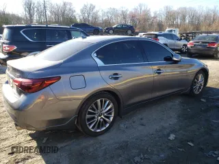 2020 Infiniti Q50 with VIN JN1EV7AR9LM256845, listed as a Copart auction lot 48957995 with 56,980 mi miles and Salvage Title. Bid and sale history available at DreamBid. Image 3.