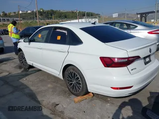 2021 Volkswagen Jetta S z VIN 3VWC57BU9MM036647, wystawiony jako IAAI lot #42107534 z przebiegiem 62 319 mil mil oraz . Historia ofert i sprzedaży dostępna na DreamBid. Obrazek 3.