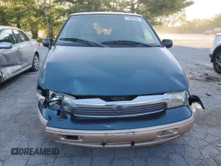 1997 Mercury Villager GS z VIN 4M2DV1119VDJ63417, wystawiony jako Copart lot #75462584 z przebiegiem 132 875 mil mil oraz Szkody całkowita. Historia ofert i sprzedaży dostępna na DreamBid. Obrazek 5.