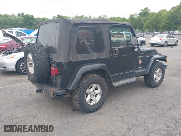 2001 Jeep Wrangler Sahara with VIN 1J4FA59S41P376079, listed as a IAAI auction lot 42739280 with 255,999 mi miles and . Bid and sale history available at DreamBid. Image 4.