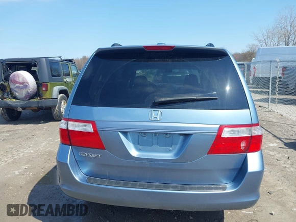 2007 Honda Odyssey EX-L with VIN 5FNRL38727B092077, listed as a IAAI auction lot 41972810 with 211,770 mi miles and . Bid and sale history available at DreamBid. Image 17.