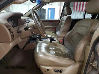 2002 Jeep Grand Cherokee Limited with VIN 1J4GW58NX2C248892, listed as a Copart auction lot 55574615 with 164,010 mi miles and Salvage title. Bid and sale history available at DreamBid. Image 7.