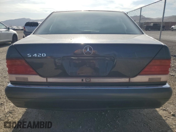 1995 Mercedes-Benz S with VIN WDBGA43E9SA233994, listed as a Copart auction lot 65867264 with 655,674 mi miles and Salvage Title. Bid and sale history available at DreamBid. Image 6.