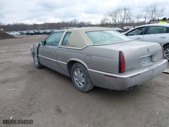 2000 Cadillac Eldorado with VIN 1G6EL12Y9YU184545, listed as a IAAI auction lot 40993392 with 51,983 mi miles. Bid and sale history available at carsss.com. Image 3.