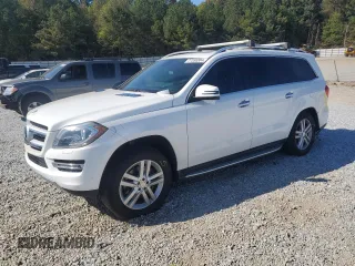 2016 Mercedes-Benz GL with VIN 4JGDF6EEXGA696311, listed as a Copart auction lot 77358304 with 113,398 mi miles and Salvage Title. Bid and sale history available at carsss.com. Image 1.