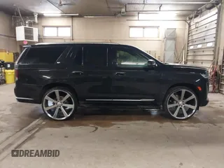 2021 Cadillac Escalade Luxury z VIN 1GYS4AKL7MR295510, wystawiony jako IAAI lot #38398966 z przebiegiem 26 228 mil mil oraz . Historia ofert i sprzedaży dostępna na DreamBid. Obrazek 13.