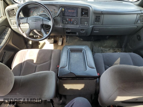 2004 GMC Sierra 1500 SLE with VIN 1GTEK19T54E305571, listed as a Copart auction lot 56954375 with 174,649 mi miles and Salvage title. Bid and sale history available at DreamBid. Image 8.